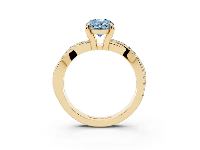 Fancy Blue Oval Cut Diamond Twist Band Solitaire Set in Yellow gold with Pavé Accents and Prong Setting