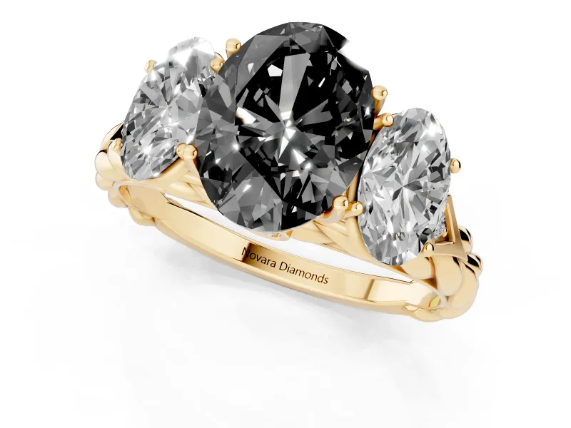 Fancy Black Oval Cut Diamond Three-Stone Ring Set in Yellow gold with Braided Band