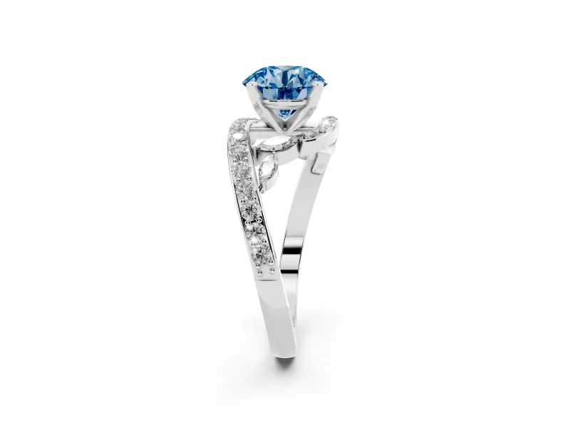 Fancy Blue Round Cut Diamond Solitaire Ring Set in White gold with Pavé Twist Band and Secure Prong Setting