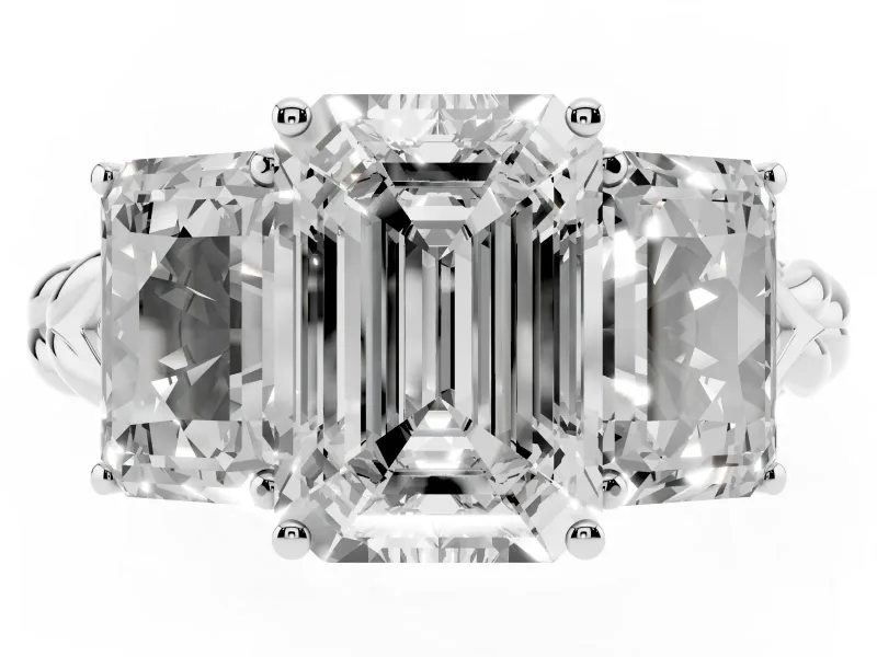 Emerald Cut Diamond Three-Stone Ring Set in White gold with Braided Band