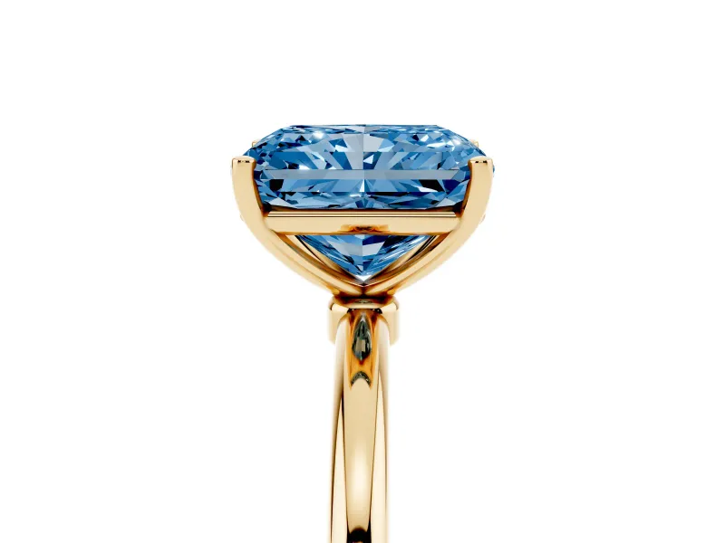 Fancy Blue Radiant Cut Diamond Solitaire Engagement Ring Set in Yellow gold with Thin Band and Prong Setting