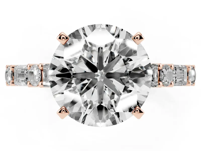 Round Cut Diamond Solitaire Set in Rose gold with Side Baguettes and Channel Set Band