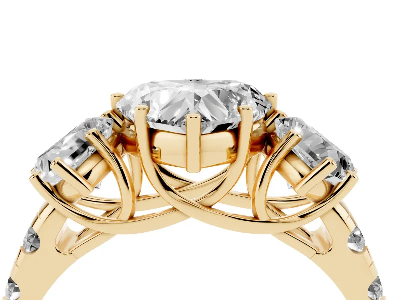 Heart Cut Diamond Three-Stone Ring Set in Yellow gold with Pavé Band