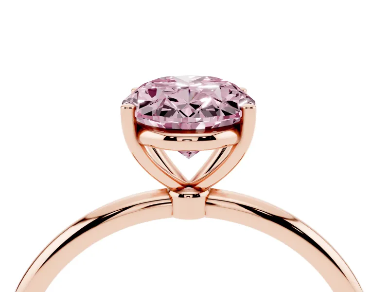 Fancy Pink Oval Cut Diamond Solitaire Engagement Ring Set in Rose gold with Thin Band and Prong Setting