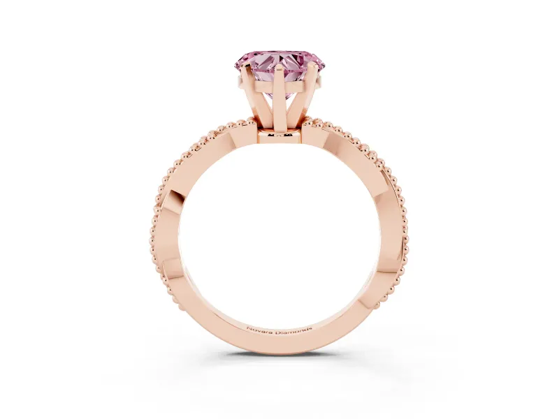 Fancy Pink Heart Cut Diamond Solitaire Ring Set in Rose gold with Twisted Band and Bead Prong Setting