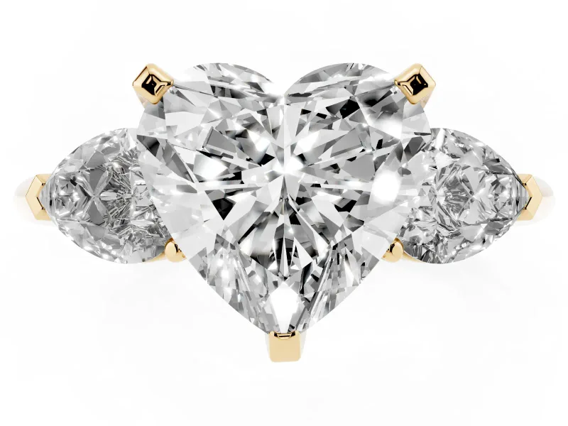 Three-Stone Heart Cut Diamond Ring Set in Yellow gold with Pear Side Stones and Prong Setting