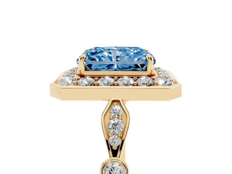 Radiant Cut Halo Engagement Ring Setting for a Fancy Blue Lab-Grown Diamond | Bezel Station Shoulders | Yellow Gold