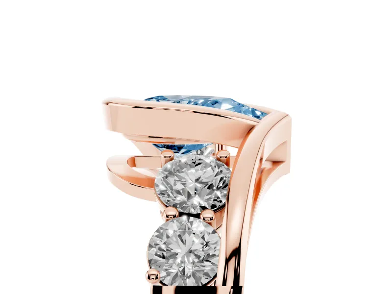 Fancy Blue Pear Cut Diamond Bezel Bypass Ring Set in Rose gold with Round Accents