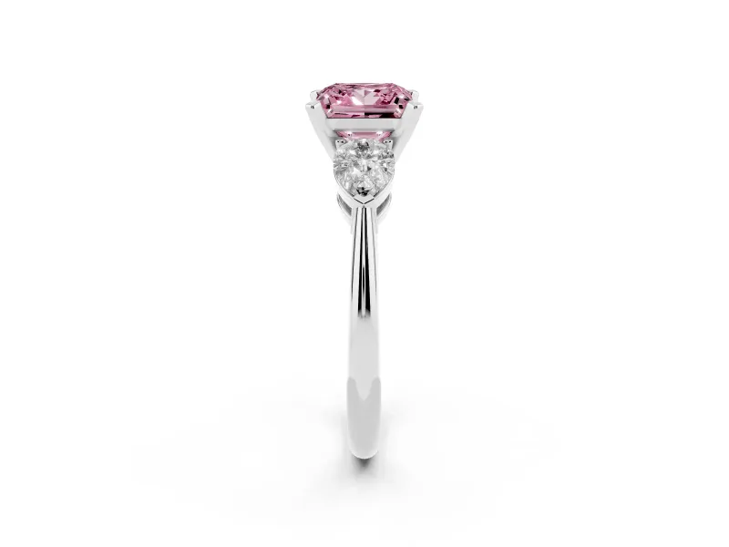 Fancy Pink Three-Stone Princess Cut Diamond Ring Set in Platinum with Pear Side Stones and Prong Setting