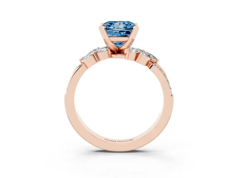 Fancy Blue Princess Cut Diamond Solitaire Ring Set in Rose gold with Marquise Twist Band and Prong Setting