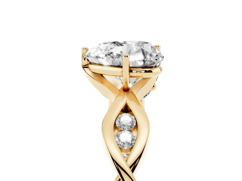 Heart Cut Diamond Twist Band Solitaire Ring Set in Yellow gold with Leaf Prong Setting and Accent Stones