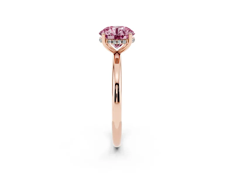Fancy Pink Round Cut Diamond Solitaire Engagement Ring Set in Rose gold with Prong Setting and Polished Band