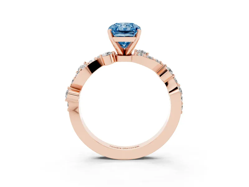 Fancy Blue Radiant Cut Diamond Solitaire Twisted Band Set in Rose gold with Pavé Setting