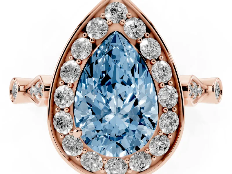 Fancy Blue Pear Cut Diamond Halo Engagement Ring Set in Rose gold with Twisted Band and Prong Setting