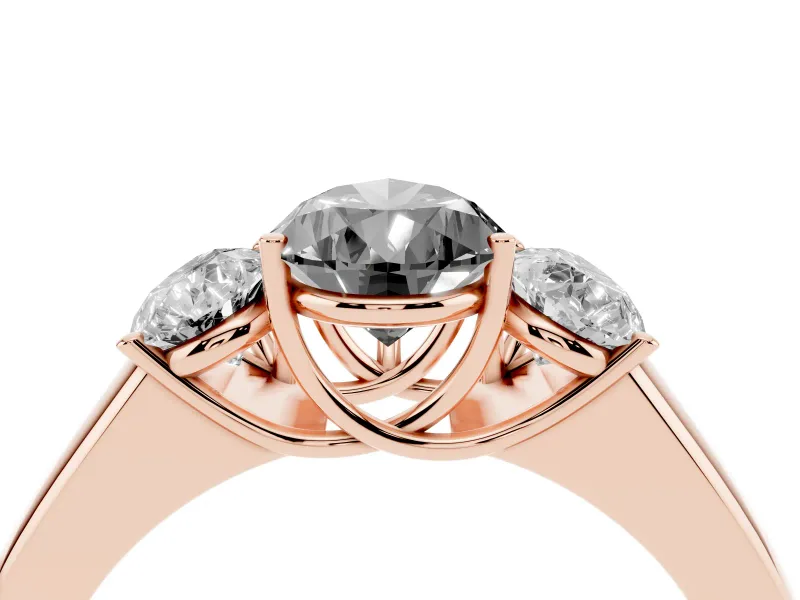Fancy Black Three-Stone Pear Cut Diamond Ring Set in Rose gold with Matching Prong Settings and Plain Band
