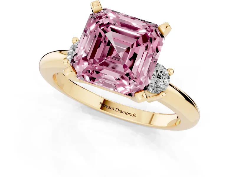 Fancy Pink Three-Stone Asscher Cut Diamond Ring Set in Yellow gold with Prong Setting and Plain Band