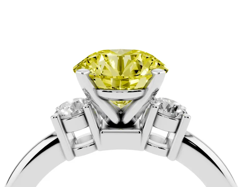 Fancy Yellow Three-Stone Round Cut Diamond Ring Set in White gold with Prong Setting and Plain Band