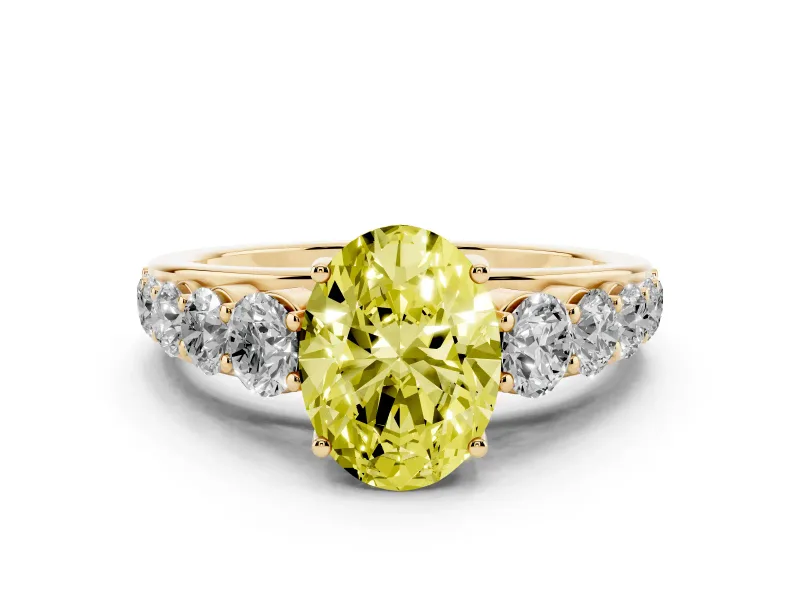 Fancy Yellow Oval Cut Diamond Solitaire Ring Set in Yellow gold with Pavé-Set Band and Prong Setting