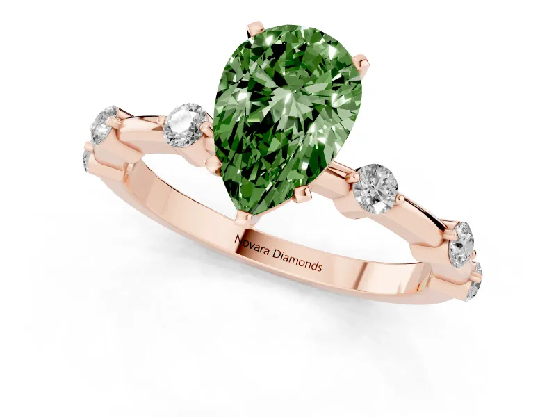 Fancy Green Pear Cut Diamond Solitaire Ring Set in Rose gold with Bezel Set Side Stones and Prong Setting