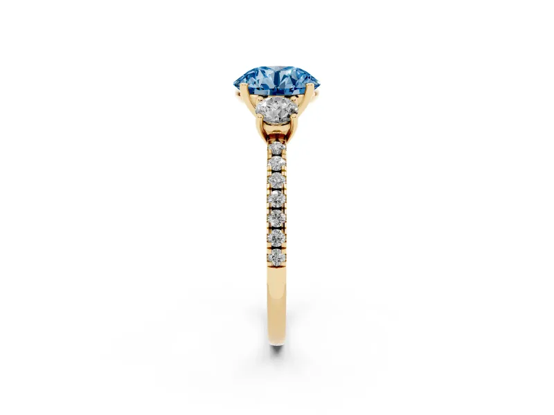 Fancy Blue Round Cut Diamond Three-Stone Ring Set in Yellow gold with Pavé Band and Graduated Sides