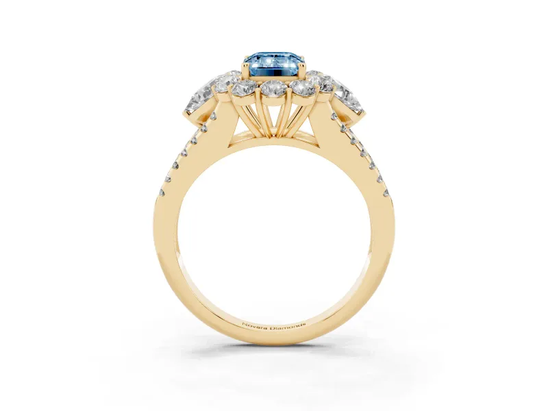 Fancy Blue Emerald Cut Diamond Halo Split Shank Engagement Ring Set in Yellow gold with Prong-Held Center Stone