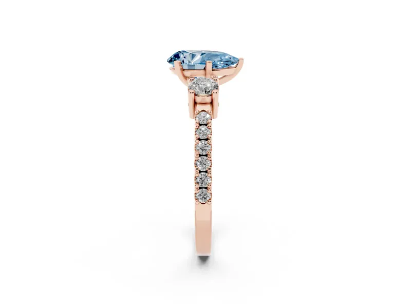 Fancy Blue Three-Stone Pear Cut Diamond Pavé Band Ring Set in Rose gold with Prong Setting