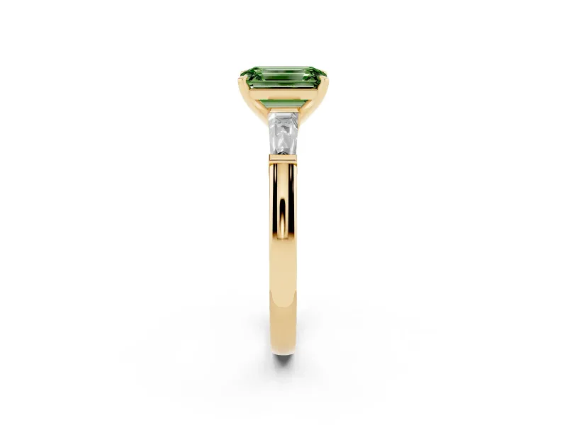 Fancy Green Emerald Cut Diamond Solitaire Ring Set in Yellow gold with Tapered Baguette Side Stones and Prong Setting