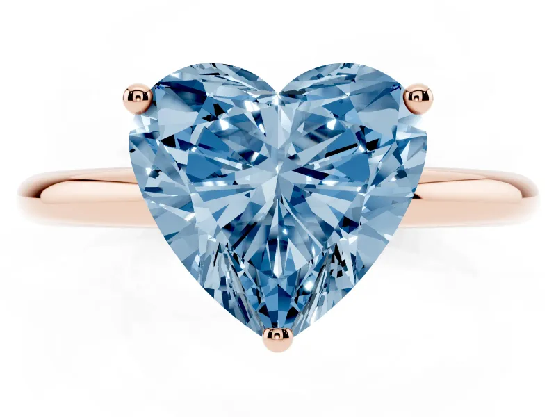 Fancy Blue Heart Cut Diamond Solitaire Engagement Ring Set in Rose gold with Prong Setting and Polished Band