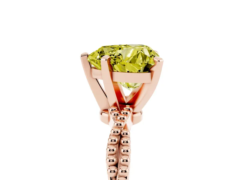 Fancy Yellow Heart Cut Diamond Solitaire Ring Set in Rose gold with Twisted Band and Bead Prong Setting