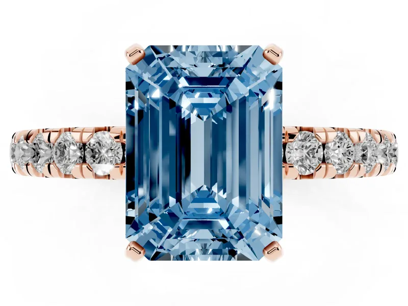 Fancy Blue Emerald Cut Diamond Pavé Solitaire Ring Set in Rose gold with Round Band and Prong Setting
