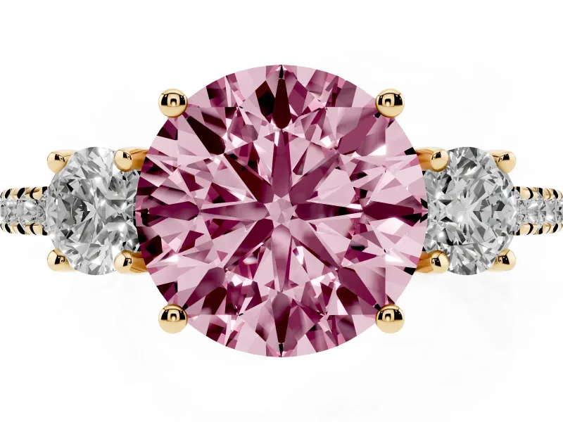 Fancy Pink Round Cut Diamond Three-Stone Ring Set in Yellow gold with Pavé Band and Graduated Sides