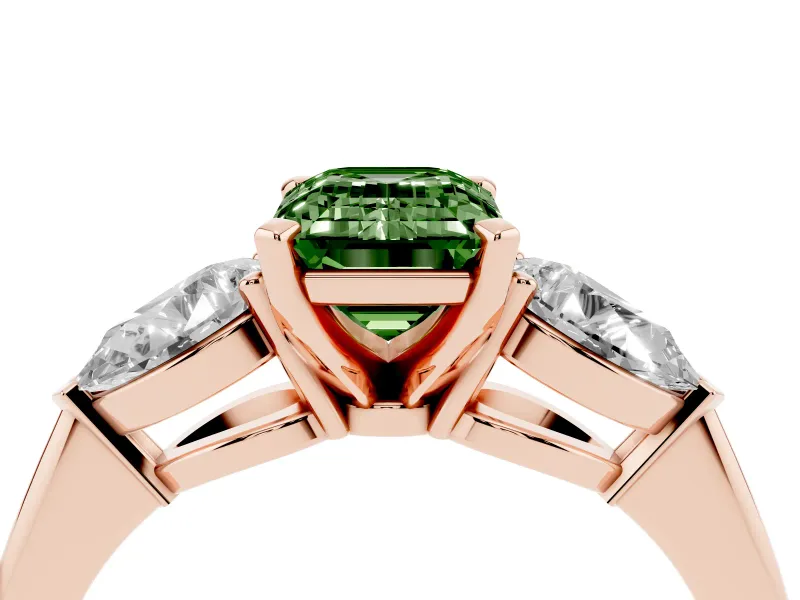 Fancy Green Three-Stone Emerald Cut Diamond Ring Set in Rose gold with Pear Side Stones and Prong Setting