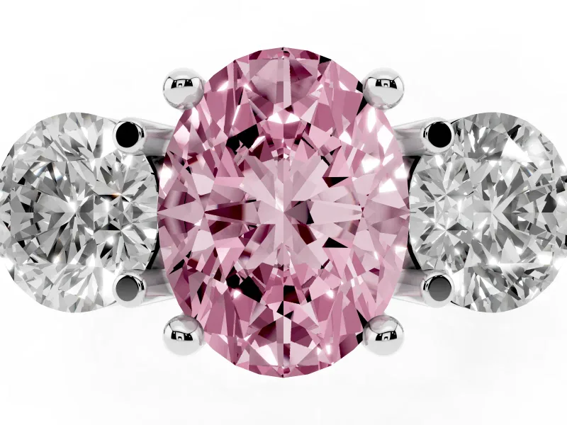 Fancy Pink Oval Cut Diamond Three-Stone Ring Set in White gold with Prong Setting and Classic Band
