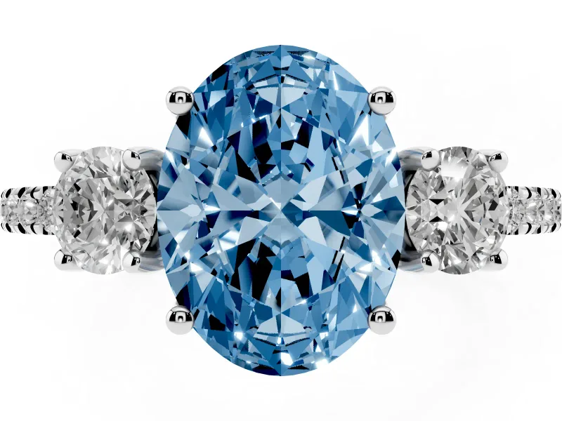 Fancy Blue Oval Cut Diamond Three-Stone Ring Set in Silver with Pavé Band and Graduated Sides