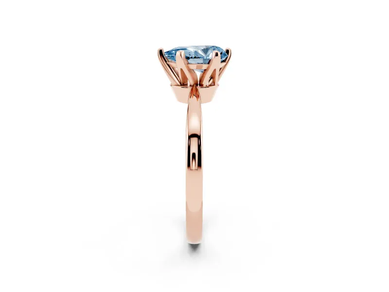 Fancy Blue Pear Cut Diamond Solitaire Engagement Ring Set in Rose gold with Slim Tapered Solitaire Band