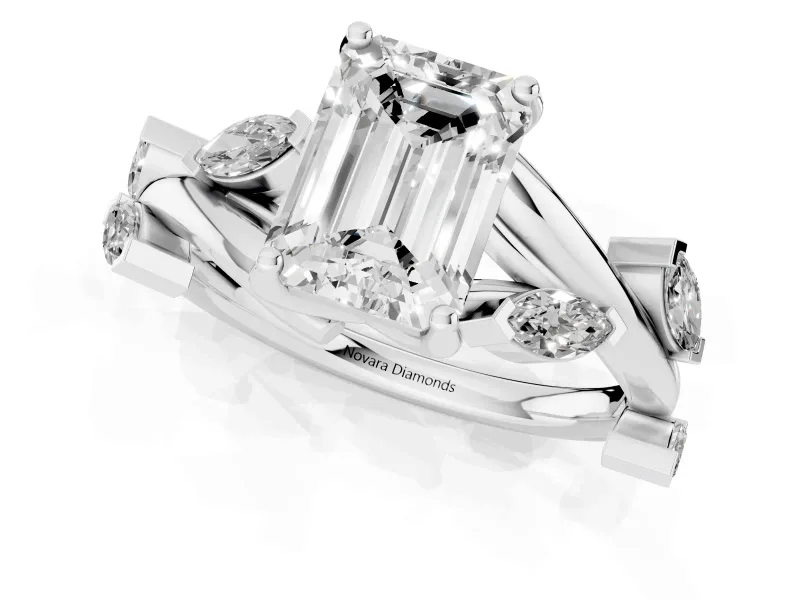 Emerald Cut Diamond Solitaire Ring Set in Platinum with Twisted Marquise Accent Band