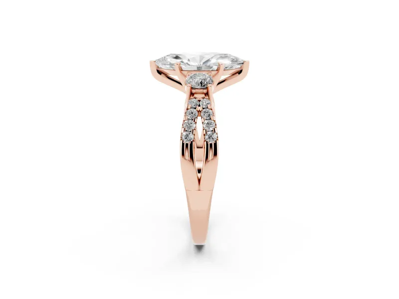 Marquise Cut Diamond Three-Stone Ring Set in Rose gold with Pavé Split Shank and Prong Setting