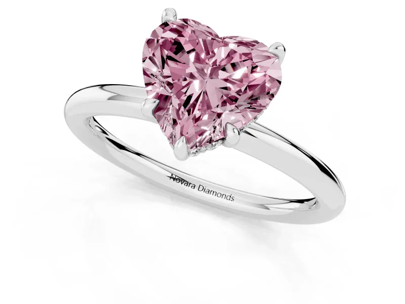 Fancy Pink Heart Cut Diamond Solitaire Ring Set in White gold with Thin Band and Prong Setting