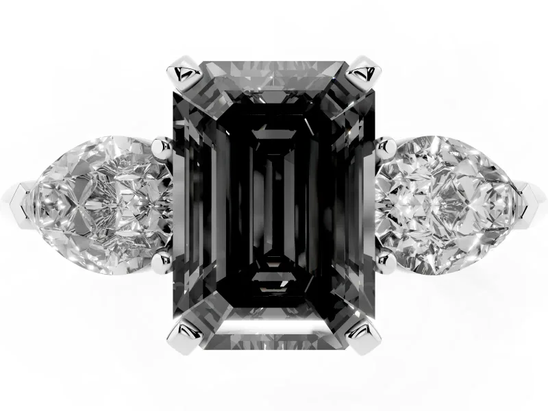 Fancy Black Three-Stone Emerald Cut Diamond Ring Set in Platinum with Pear Side Stones and Prong Setting