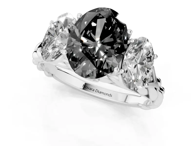 Fancy Black Oval Cut Diamond Three-Stone Ring Set in White gold with Braided Band