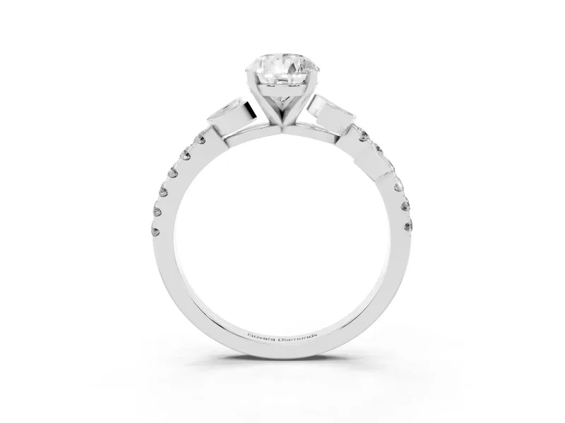 Pear Cut Diamond Solitaire Leaf-Inspired Ring Set in White gold with Pavé Band and Prong Setting