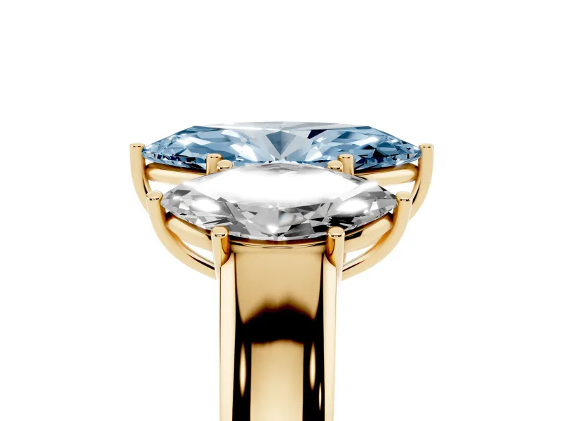 Fancy Blue Three-Stone Marquise Cut Diamond Ring Set in Yellow gold with Matching Prong Settings and Plain Band