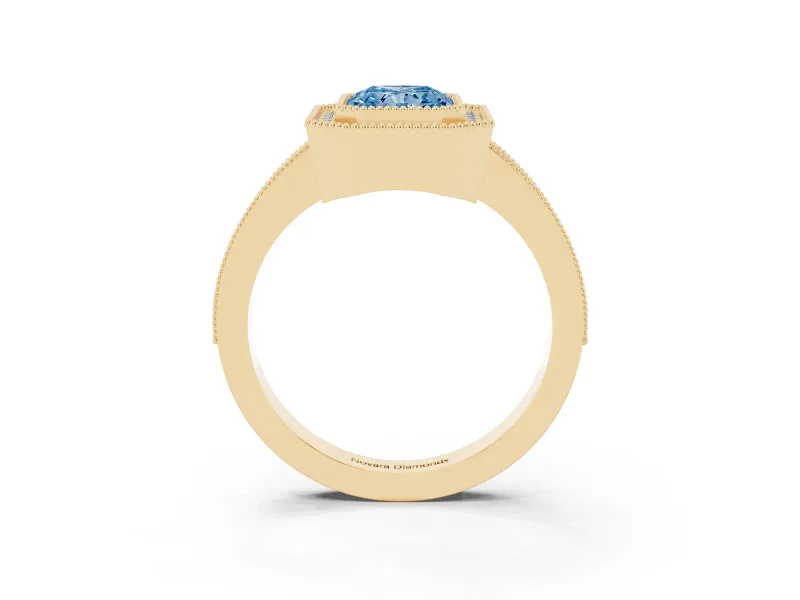 Fancy Blue Radiant Cut Diamond Halo Engagement Ring Set in Yellow gold with Pavé Band and Round Halo Stones