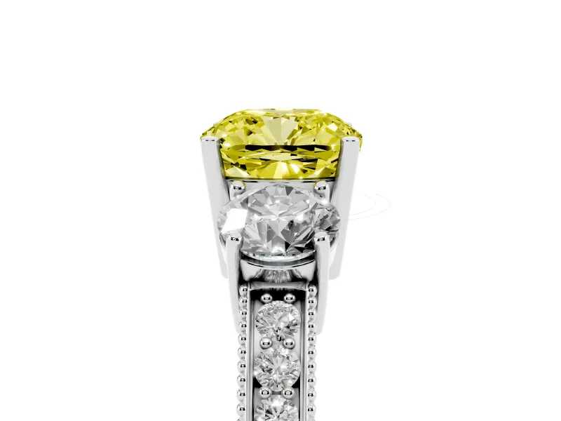 Fancy Yellow Cushion Cut Diamond Three-Stone Ring Set in White gold with Round Side Stones and Pavé Band