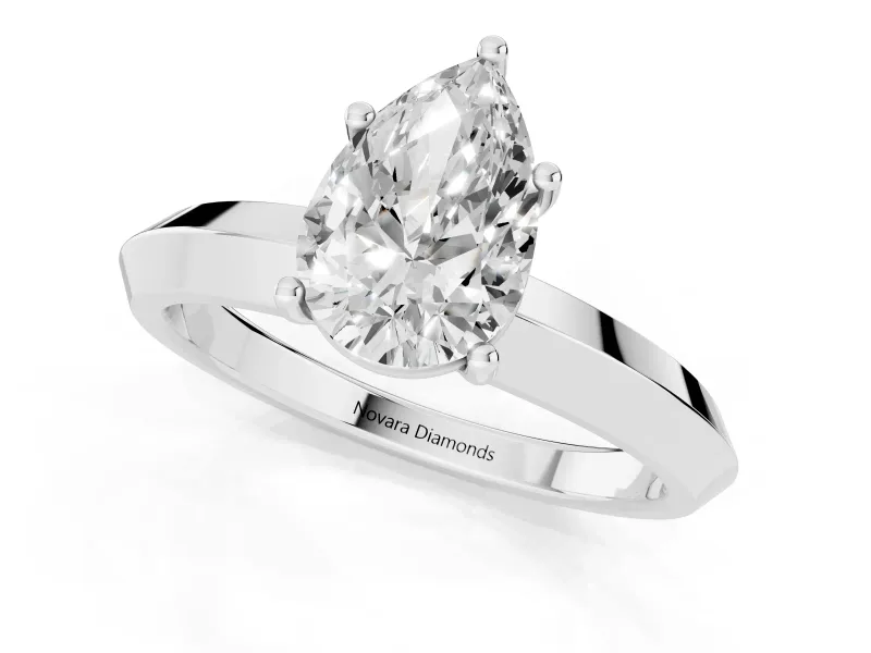 Pear Cut Diamond Solitaire Engagement Ring Set in White gold with Flat Band and Prong Setting