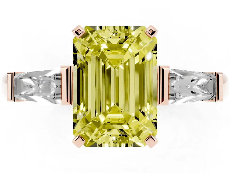 Fancy Yellow Emerald Cut Diamond Solitaire Ring Set in Rose gold with Tapered Baguette Side Stones and Prong Setting