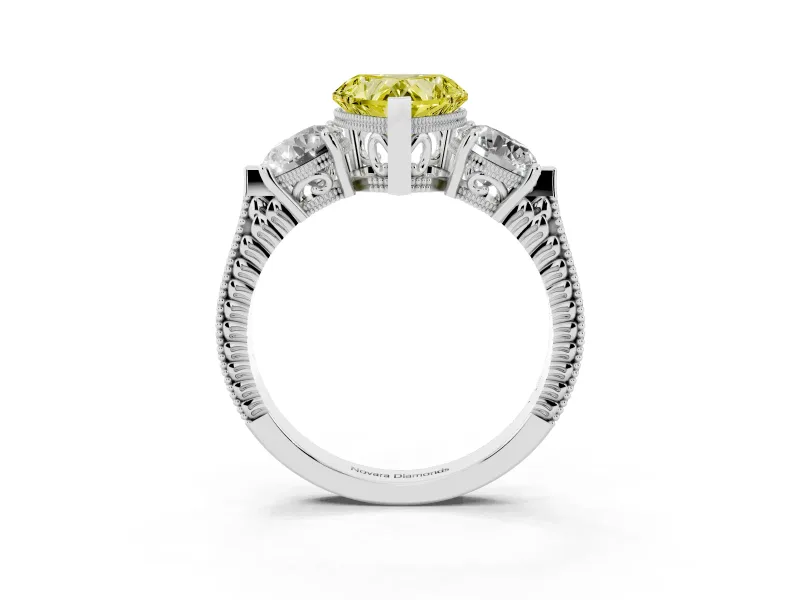 Fancy Yellow Heart Cut Diamond Three-Stone Ring Set in Platinum with Milgrain Band