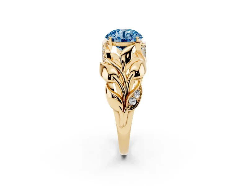 Fancy Blue Round Cut Diamond Leaf-Inspired Engagement Ring Set in Yellow gold with Round Accents