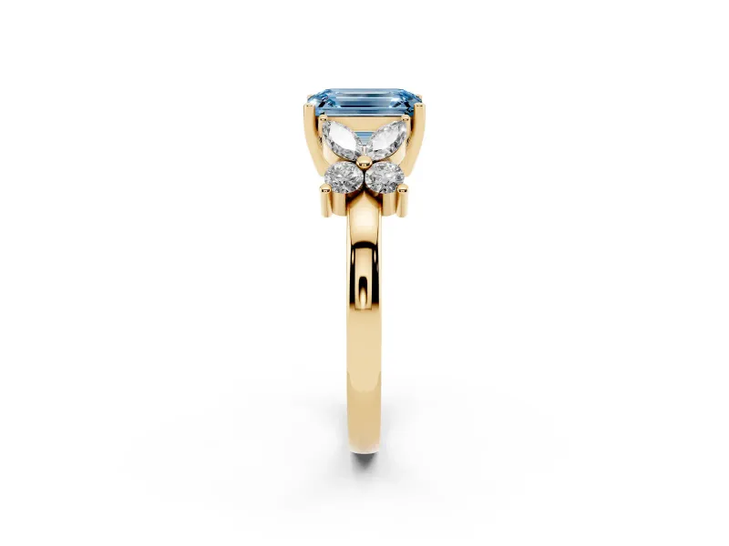 Fancy Blue Emerald Cut Diamond Floral Cluster Ring Set in Yellow gold with Marquise Petals and Prong Setting