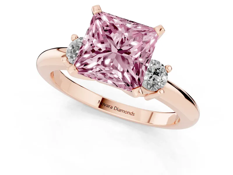 Fancy Pink Three-Stone Princess Cut Diamond Ring Set in Rose gold with Prong Setting and Plain Band